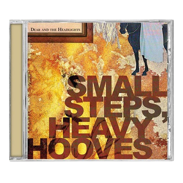CD cover for Small Steps, Heavy Hooves by Dear and the Headlights features bold stylized text on a yellow-brown textured background, partial horse and frame illustrations, reflecting an alt-country/pop-rock aesthetic. Brand: Dear and the Headlights.