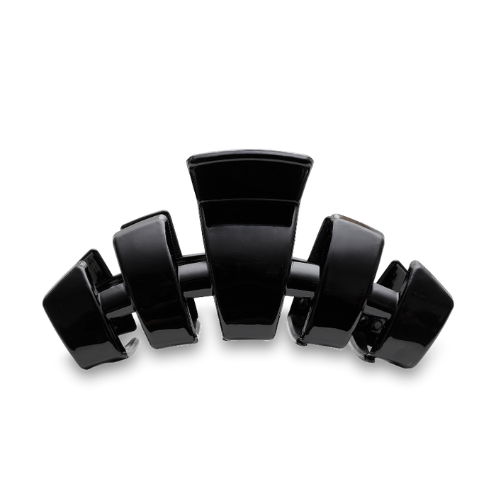 Black hair clip on a white background