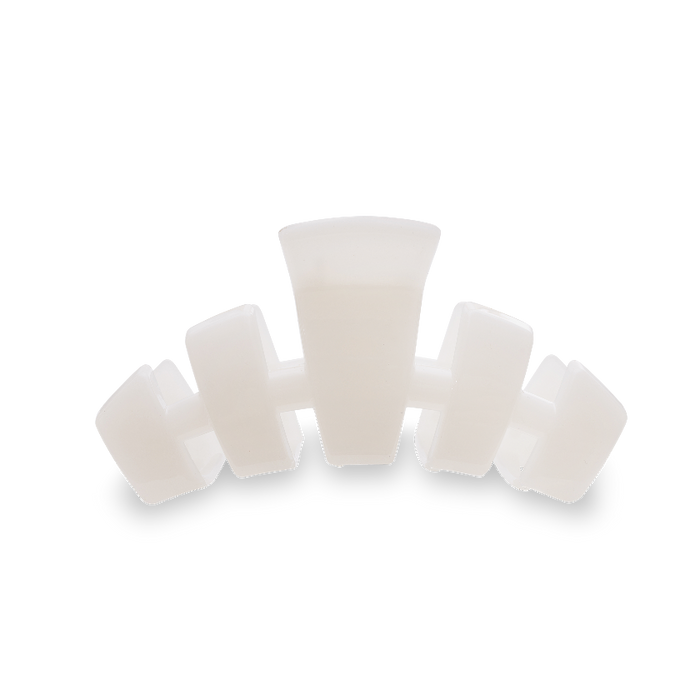 Set of white silicone cups on a white background