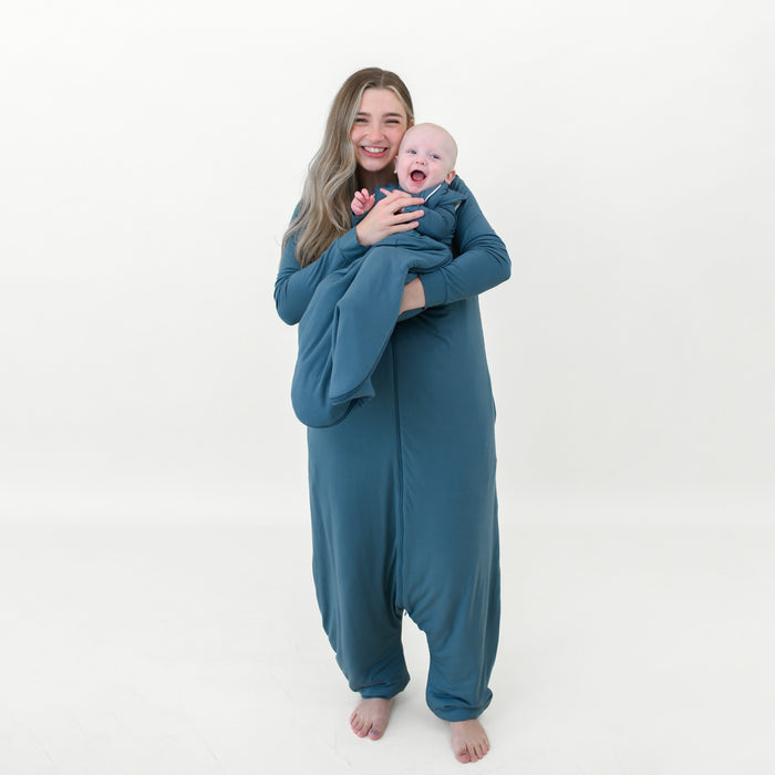 Mother wearing the Adult Sleep Bag Walker in Atlantic holding infant wearing a Sleep Bag in Atlantic