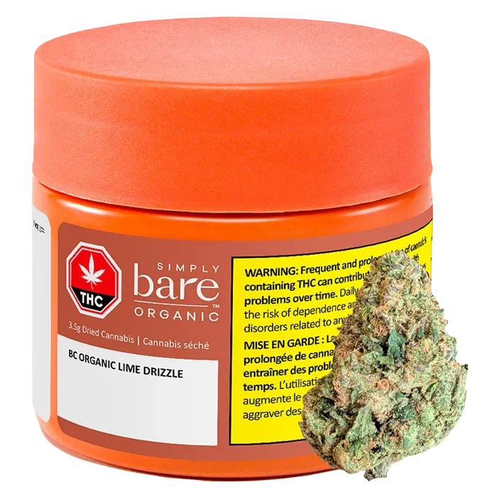 Close-up front view of a round orange jar labeled "BC Organic Lime Drizzle" from Simply Bare Organic with a cannabis bud resting against its right side.