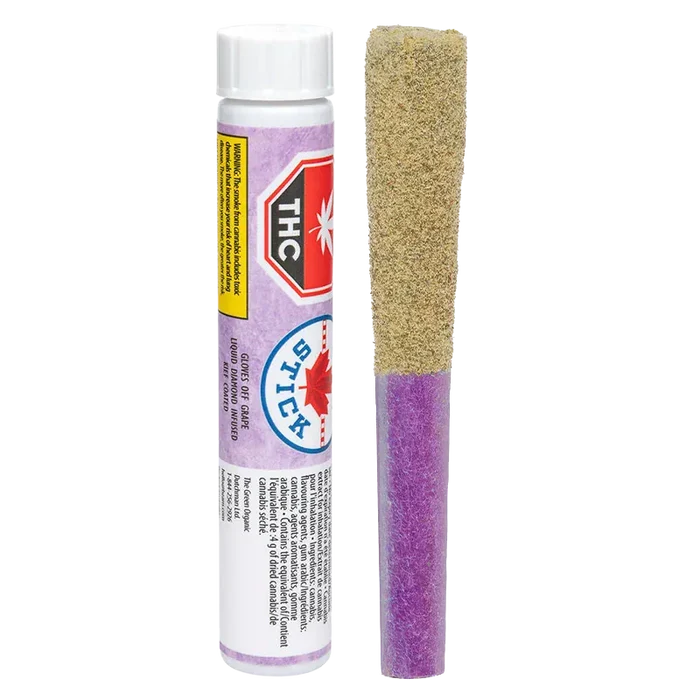 Straight-on studio shot of a BC Organic Mandarin Zktz pre-roll with a purple paper tip and kief-coated top standing beside its labeled white tube.