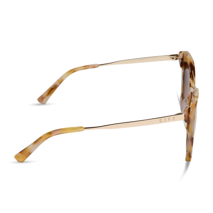 diff eyewear becky ii cat eye sunglasses with a gilded tortoise acetate frame and brown gradient lenses side view