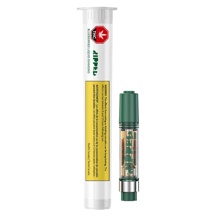 Vertical product shot of a Blueberried Liquid Diamond Vape Cartridge showing the clear 0.95 g cartridge with green mouthpiece beside its white tube packaging.
