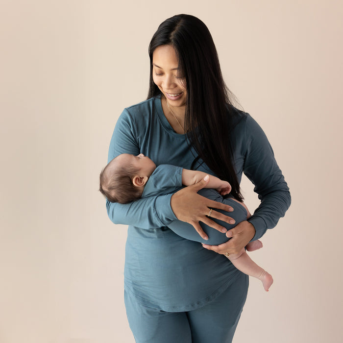 Mom wearing Atlantic Women's Jogger Pajama Set holding infant in blue onesie
