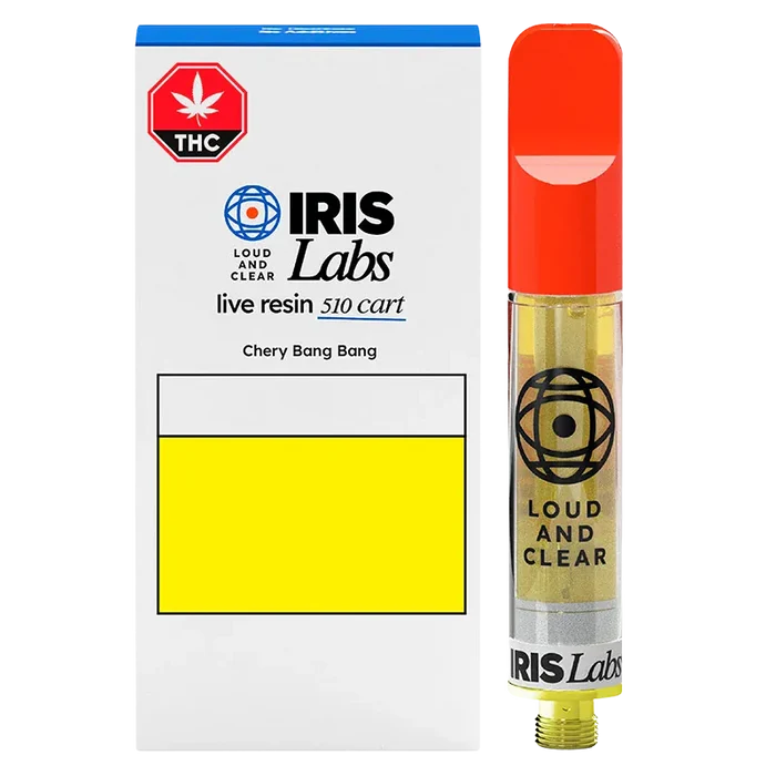 Front view of the Cherry Bang Bang Live Resin Vape Cartridge showing the Iris Labs white box with yellow label beside a clear cartridge with red mouthpiece and gold oil.