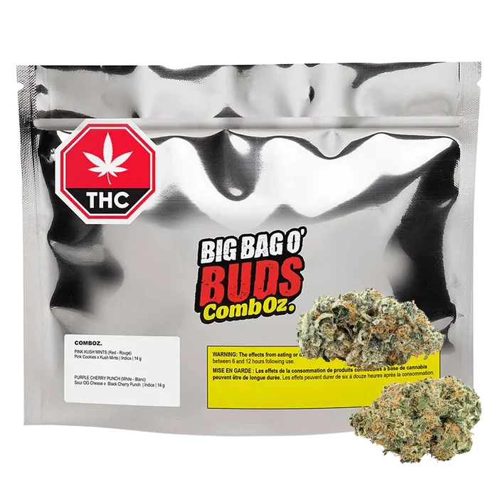 Front-facing shot of a reflective silver pouch labeled Big Bag O' Buds with a THC symbol and two loose purple-green buds, Comboz Purplecherry.