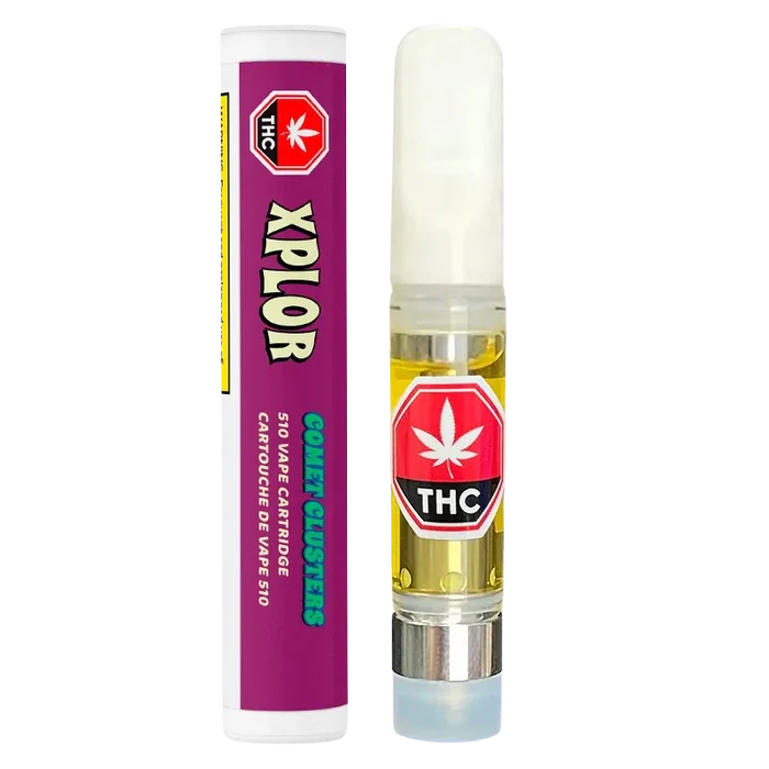 Straight-on product shot of a Comet Clusters Vape Cartridge showing the clear 510 cartridge of amber oil with a white mouthpiece next to its purple cylindrical packaging.