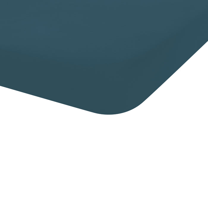 Crib Sheet in Atlantic corner shown on a crib mattress