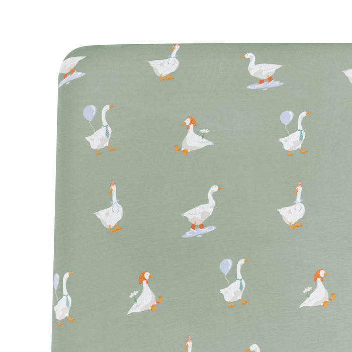 Close up on the corner of the Crib Sheet in Silly Goose on a crib mattress
