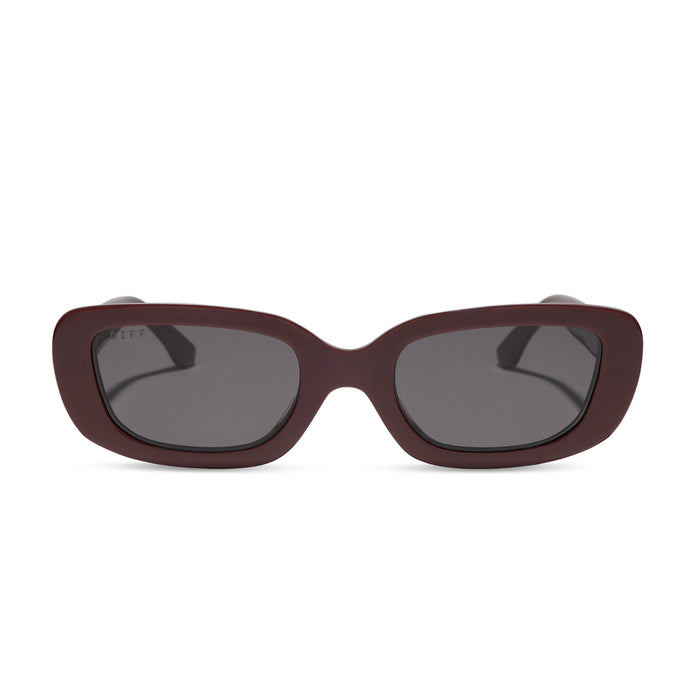 diff eyewear featuring the daphne rectangle sunglasses with a rugby red acetate frame and grey polarized lenses front view