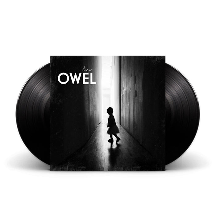 This limited double LP Dear Me vinyl by OWEL showcases a cover with a child’s silhouette in a dark hallway and features white band and album text at the top left, making it a uniquely collectible edition.