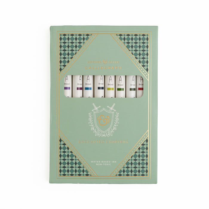 Set of calliographs in a decorative green box with geometric patterns