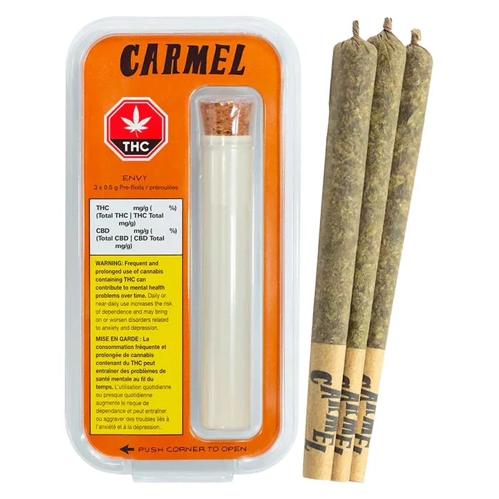 Front-facing shot of the Envy PR 3 x 0.5 g package with an orange-backed blister pack and three pre-rolled joints shown to its right.
