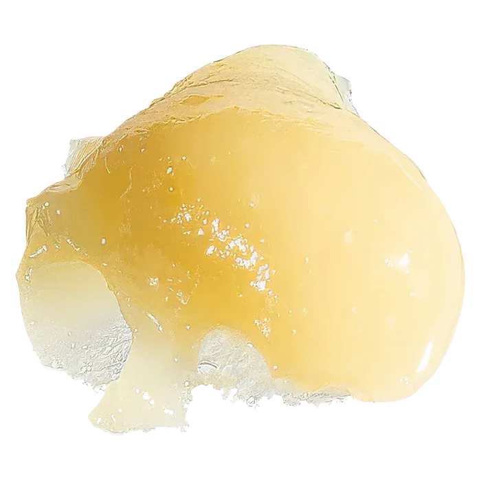 Close-up of a glossy golden dab of Gas Leak Rosin resting on a translucent, crystalline surface with bright, even lighting.