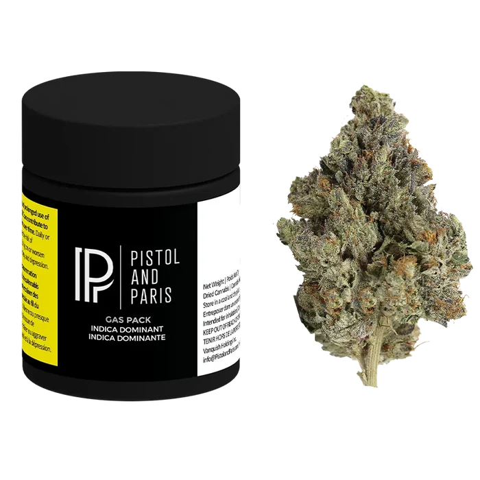 Three-quarter front view of a black Pistol and Paris Gas Pack jar beside a frosty green cannabis bud on a white background