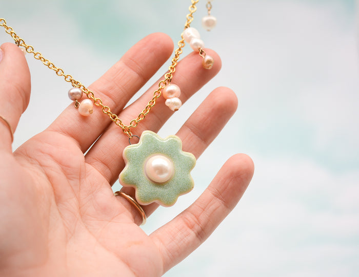Green Daisy with Pearl Necklace