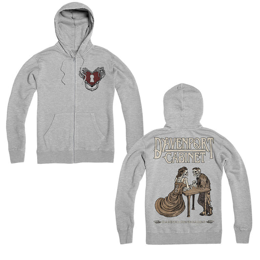 The Davenport Cabinet heather grey zip-up hoodie features a small crest on the front left chest and a large illustration of a woman and skeleton shaking hands with “Davenport Cabinet” text on the back.