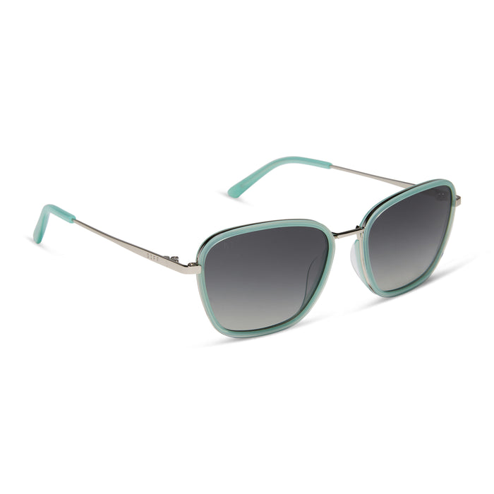 jena sims x diff eyewear featuring the hope cat eye sunglasses with a bronco blue frame and grey gradient polarized lenses angled view