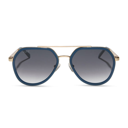 diff eyewear featuring the joey round sunglasses with a clubhouse blue & brushed gold metal frame with grey gradient lenses front view