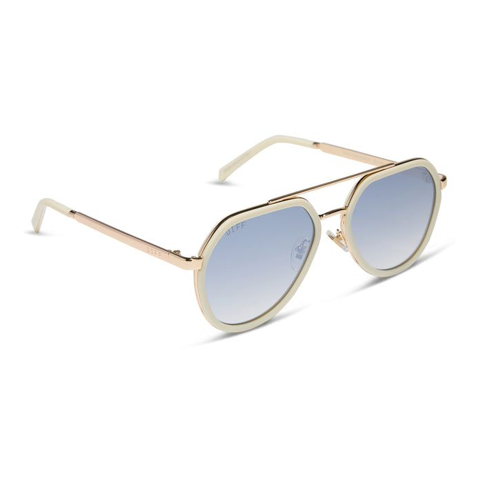 diff eyewear featuring the joey round sunglasses with a courtside ivory & gold metal frame with blue slate gradient flash lenses angled view