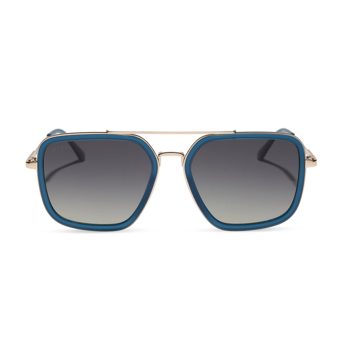 diff eyewear featuring the jordan navigator sunglasses with a clubhouse blue frame and gold metal with grey gradient polarized lenses front view