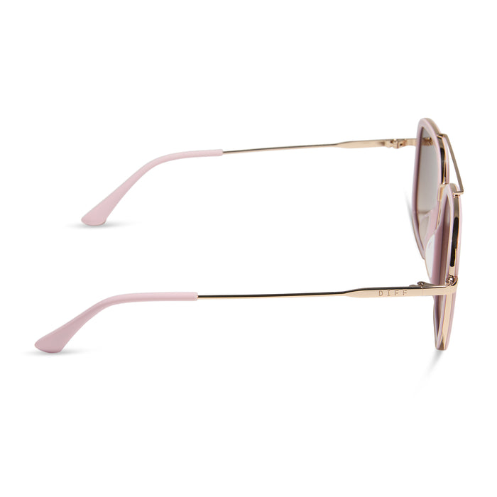 diff eyewear featuring the jordan navigator sunglasses with a powder pink with gold frame and brown gradient lenses side view