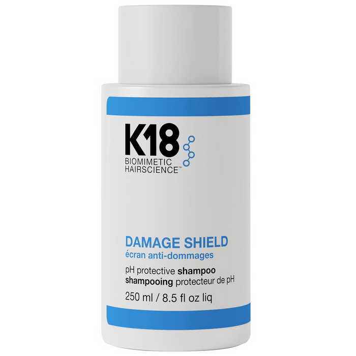 K18 Damage Shield shampoo bottle on a white background
