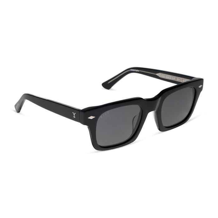yellowstone x diff eyewear featuring the kayce dutton square sunglasses with a classic black acetate frame and grey polarized lenses angled view