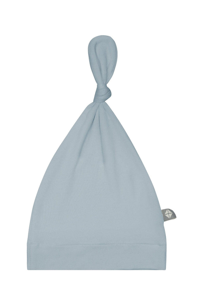 Flat lay of Kyte Baby Knotted Cap in Fog