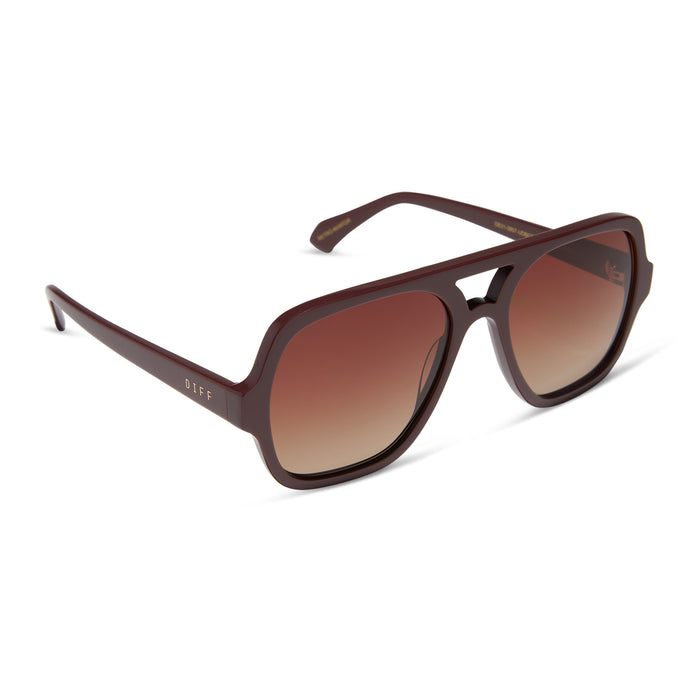 diff eyewear featuring the layton navigator sunglasses with a rugby red acetate frame and brown gradient polarized lenses angled view