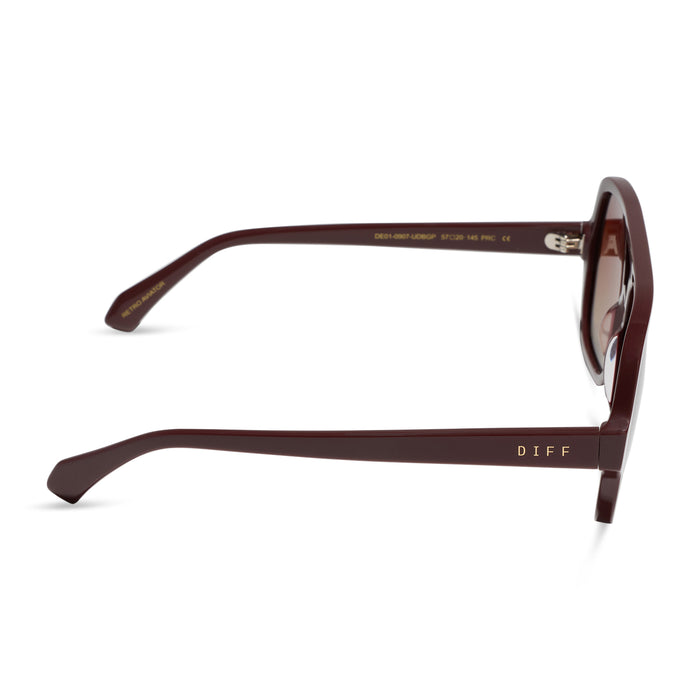 diff eyewear featuring the layton navigator sunglasses with a rugby red acetate frame and brown gradient polarized lenses side view