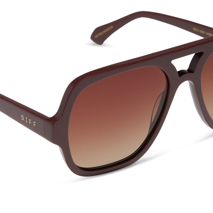 diff eyewear featuring the layton navigator sunglasses with a rugby red acetate frame and brown gradient polarized lenses detailed view