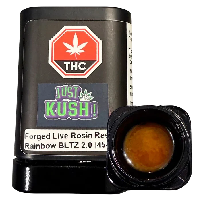 Close-up front view of a black jar and open pot of amber concentrate labeled Live Rosin Reserve, the "Just Kush!" sticker and THC octagon visible.