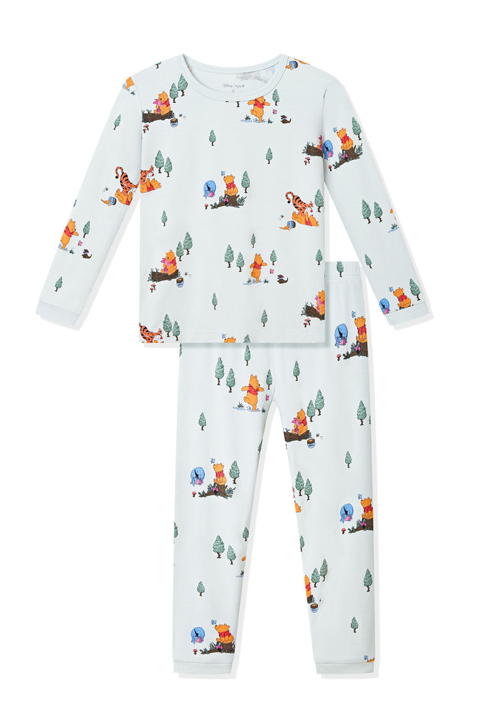 Long Sleeve Pajamas in Winnie the Pooh Hundred Acre Wood print on a white background