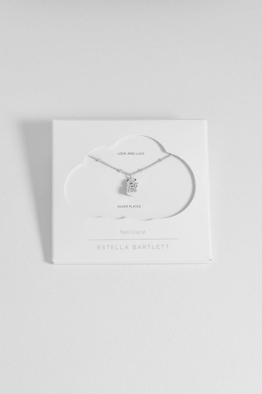 Necklace with a pendant on a white card with 'Estella Bartlett' branding on a light gray background