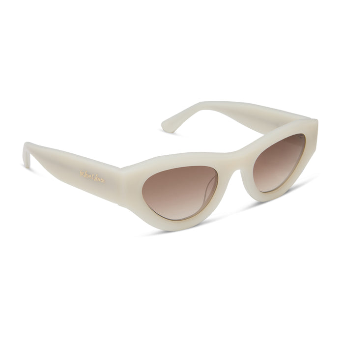 for love & lemons x diff eyewear featuring the lucy cat eye sunglasses with a meringue acetate frame and brown gradient lenses angled view