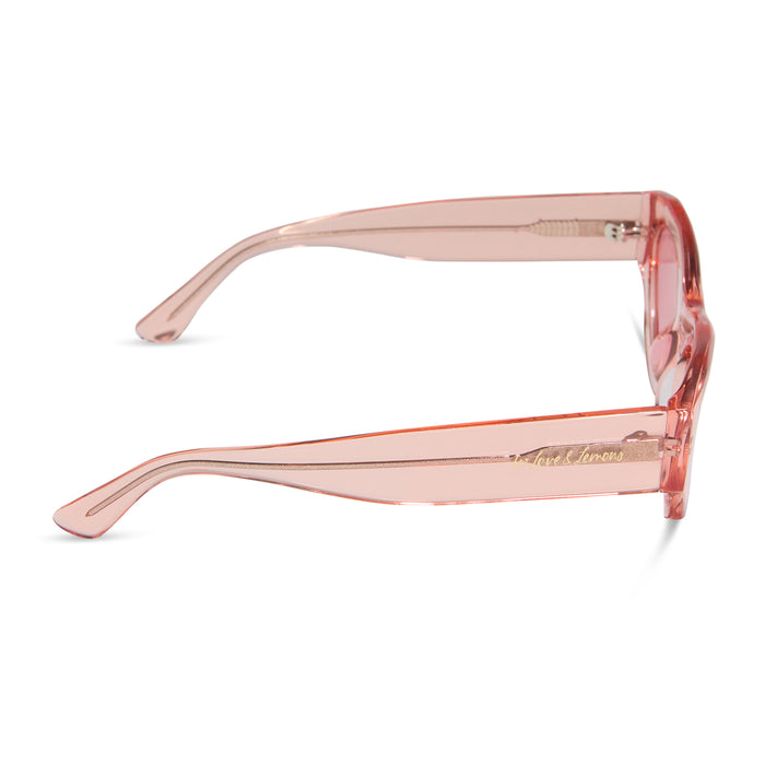 for love & lemons x diff eyewear featuring the lucy cat eye sunglasses with a pastel pink acetate frame and rose pink lenses side view