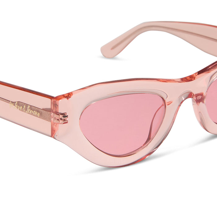 for love & lemons x diff eyewear featuring the lucy cat eye sunglasses with a pastel pink acetate frame and rose pink lenses detailed view