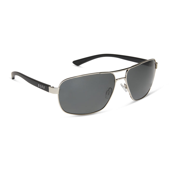 diff sport featuring the matchpoint aviator sunglasses with a silver frame matte black temples and grey polarized lenses angled view