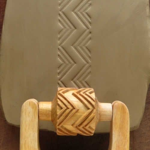 MKM Medium Handle Roller in the Double Zag pattern, twin bands of nested zigzags in grey clay