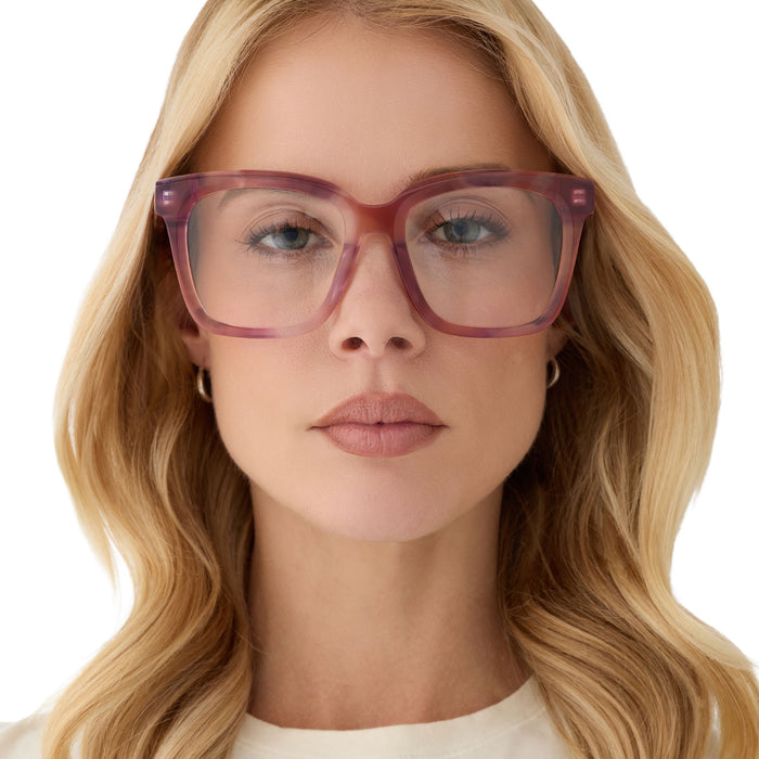 on model - blonde female wearing diff eyewear featuring the meredith square prescription glasses with a fleur pink tortoise frame front view