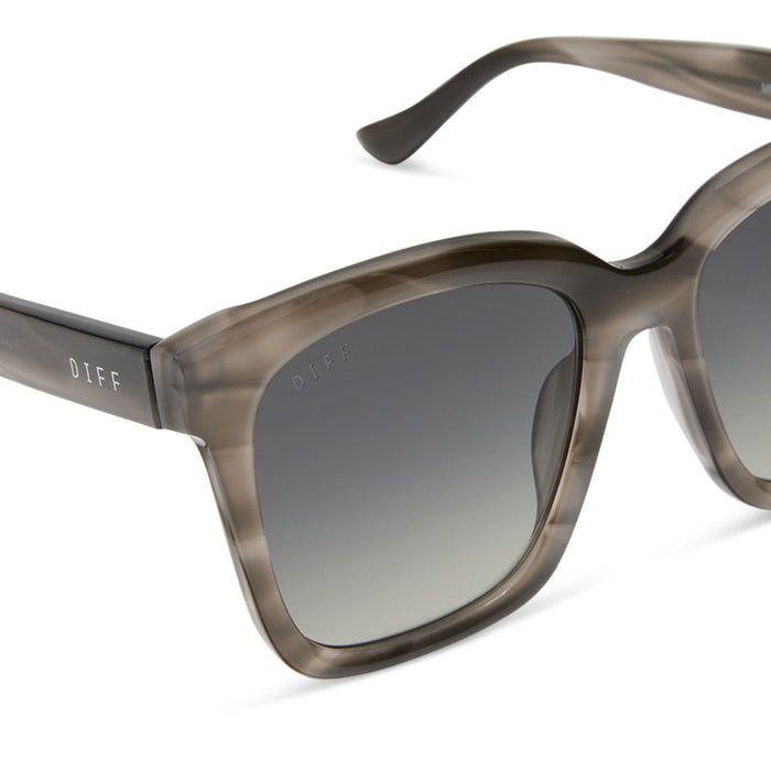 diff eyewear featuring the meredith square sunglasses with a smoke marble frame and grey gradient polarized lenses detailed view