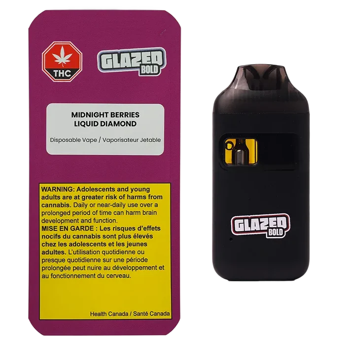 Packshot of the Midnight Berries Liquid Diamond Disposable Vape showing a magenta product box with warnings beside a black vape device with a small window and Glazed Bold logo.