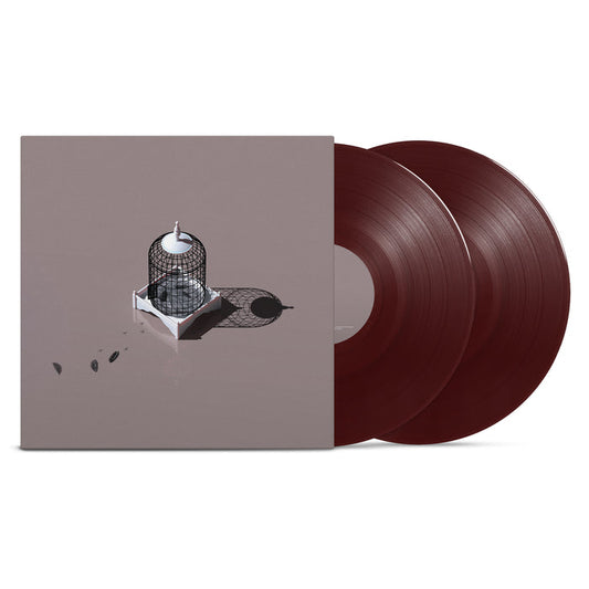 Two blood red vinyls peek out of a light pink cover with an empty bird cage in the middle. A couple feathers are left behind on the floor.