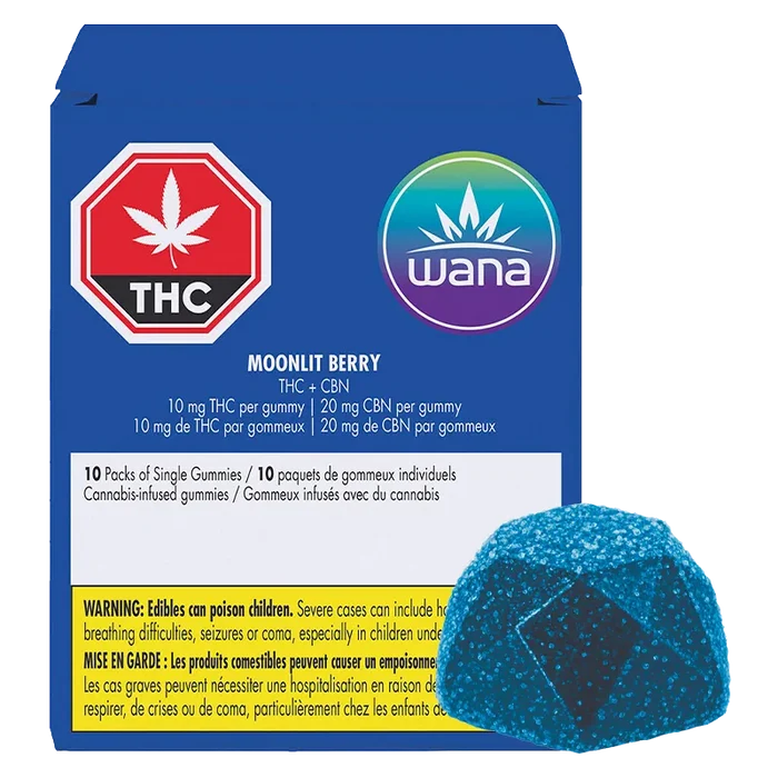 Front view of the blue box and single sugar-coated gummy for Moonlit Berry Gummies, showing the Wana logo and THC warning.