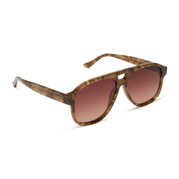 jessie james decker x diff eyewear featuring the nash navigator sunglasses with a black walnut tortoise frame and brown gradient lenses angled view