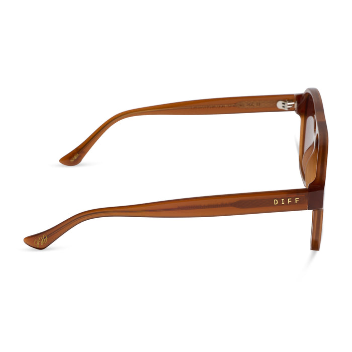 jessie james decker x diff eyewear featuring the nash navigator sunglasses with a milk caramel frame and brown gradient lenses side view