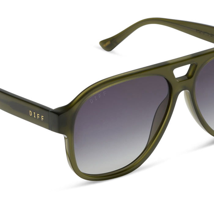 jessie james decker x diff eyewear featuring the nash navigator sunglasses with a milky olive green frame and grey gradient lenses detailed view