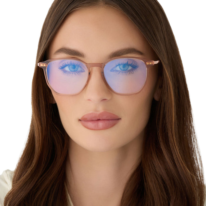 on model - female wearing diff eyewear featuring the noel round prescription glasses with a  brown café ole frame front view
